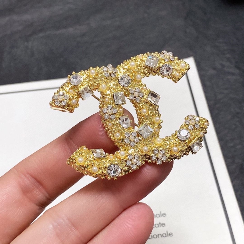 Ch**el brooches